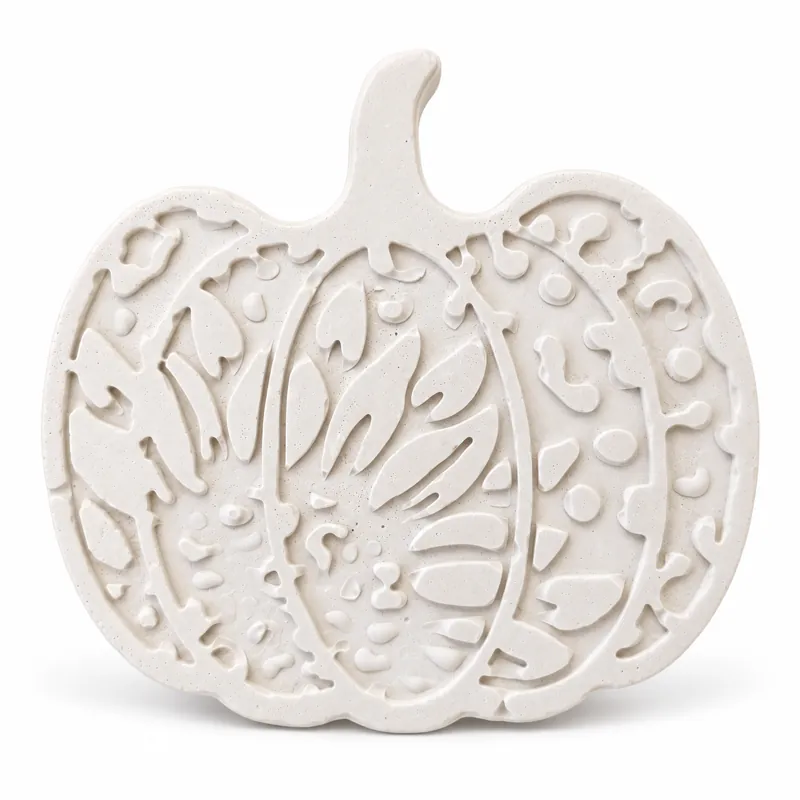 Unpainted Harvest Filigree Pumpkin plaster figure on a white background