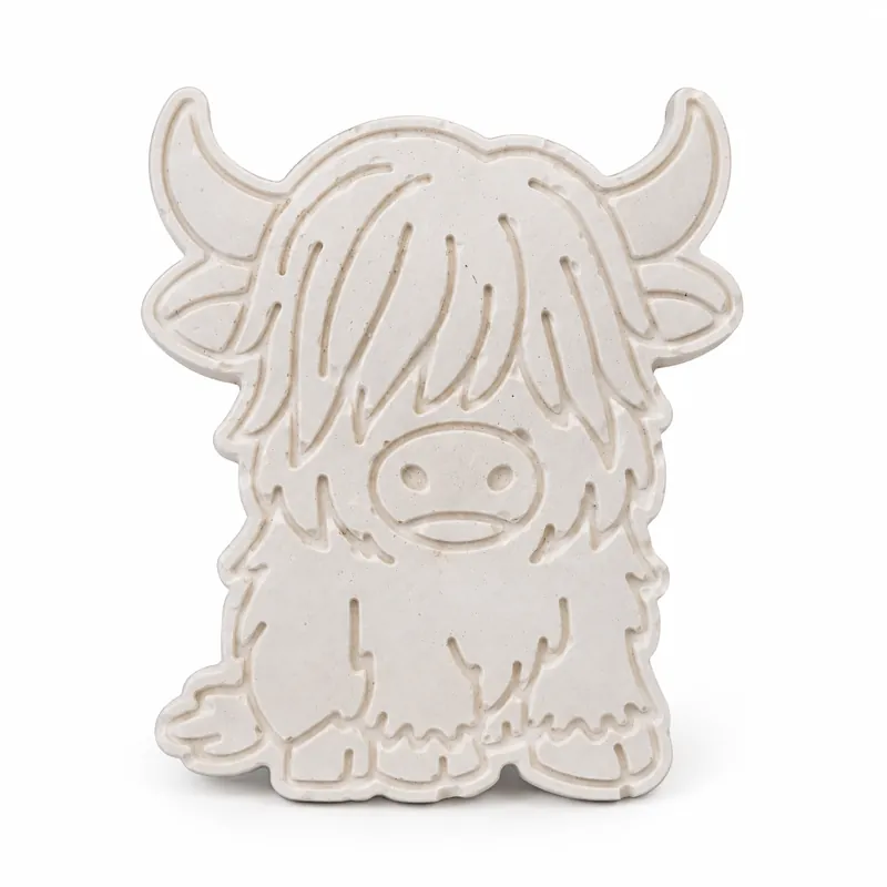 Unpainted Petite Highland Cow plaster figure on a white background