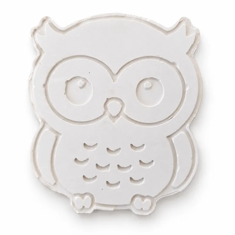 Unpainted Storybook Owl plaster craft figure on a white studio background