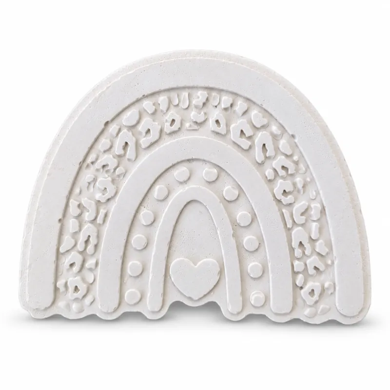 Unpainted Whimsy Heart Rainbow plaster figure on a white background