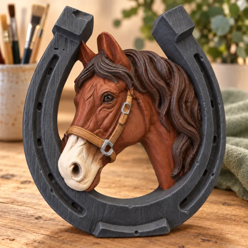 Painted Horse Portrait Horseshoe plaster figure on a craft table; color inspiration only