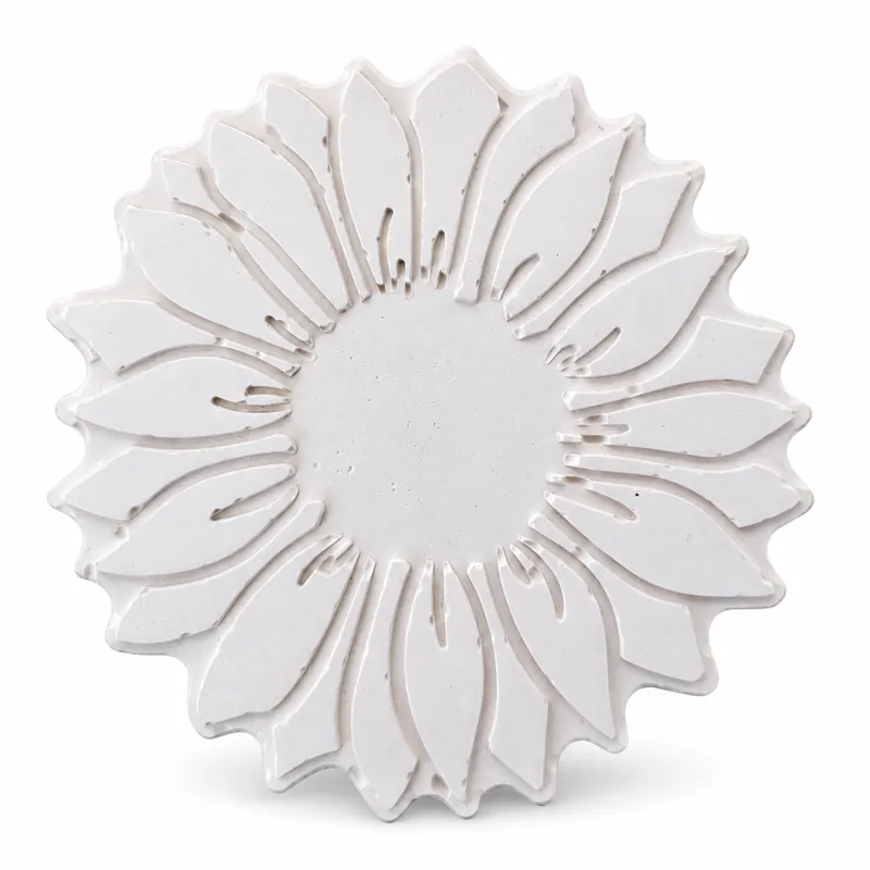 Unpainted Radiant Sunflower plaster figure on a white background