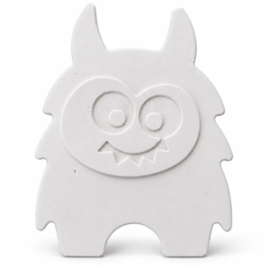 Unpainted Grinning Little Monster plaster figure on a white background