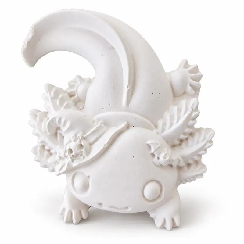 Unpainted Spooky Halloween Axolotl plaster figure on a white background