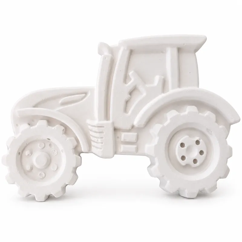 Unpainted Country Tractor plaster figure on a white background