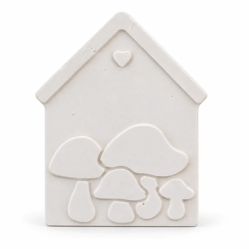 Unpainted Mushroom Cottage Plaque plaster figure on a white background